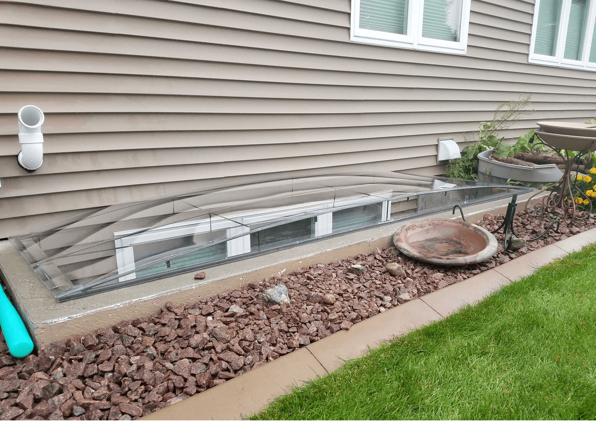 Exterior wall with basement window