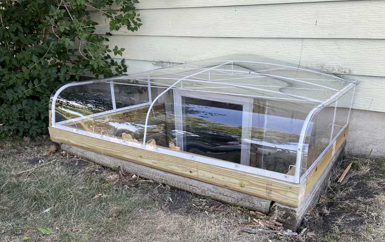 Cold frame with clear plastic cover