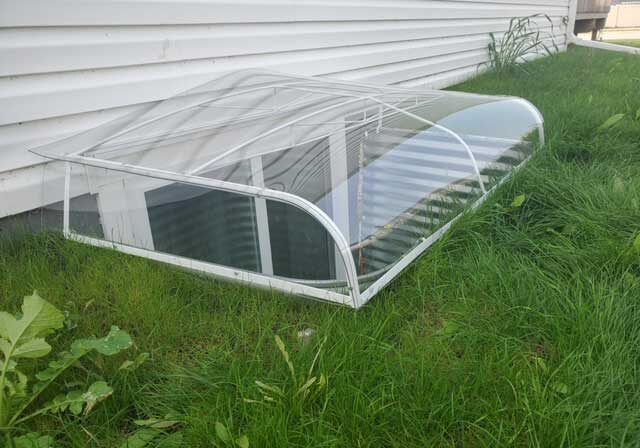 Transparent basement window protection